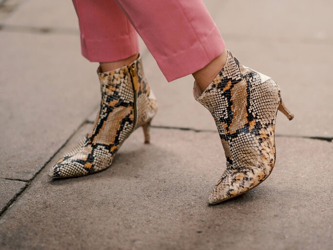 Snake Print Boots | © Getty Images | Edward Berthelot 